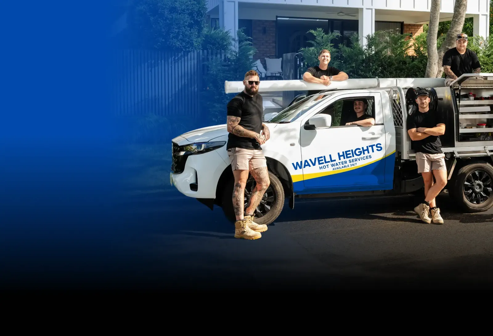 Wavell Heights Hot Water Services team with the ute